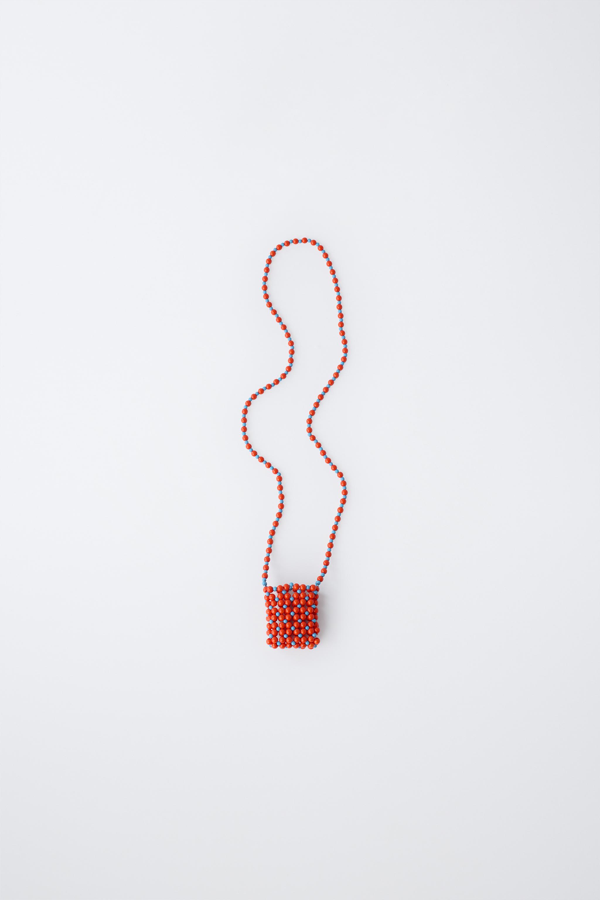 LONG BEADED NECKLACE